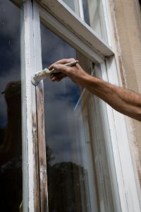 Re-painting a window frame outdoors
